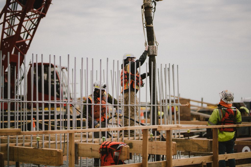 Full crew working on pier rebar formwork