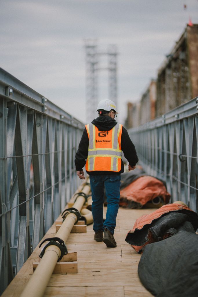 Tutor Perini worker on bridge walkway