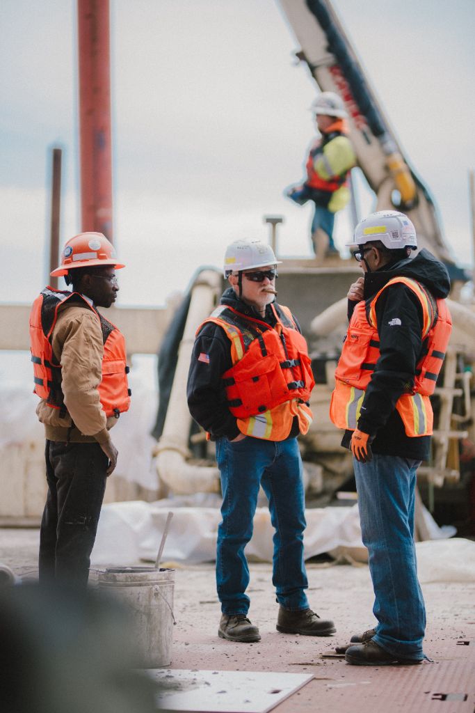 Construction crew on barge at CRB project